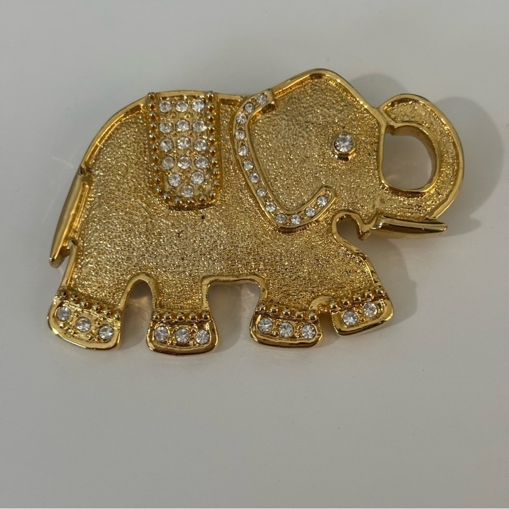 Large vintage gold tone satin finish rhinestone elephant 1999AD brooch pin